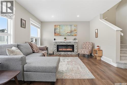 474 Schmeiser Bend, Saskatoon, SK - Indoor Photo Showing Living Room With Fireplace
