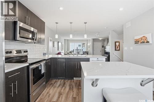 4126 Brighton Circle, Saskatoon, SK - Indoor Photo Showing Kitchen With Upgraded Kitchen