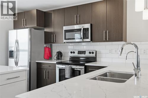 4126 Brighton Circle, Saskatoon, SK - Indoor Photo Showing Kitchen With Double Sink With Upgraded Kitchen
