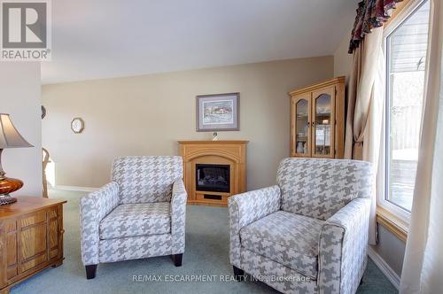 8 Jeanette Street, Hamilton, ON - Indoor Photo Showing Living Room With Fireplace