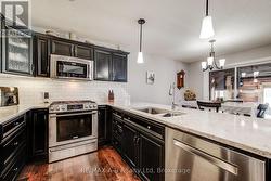 kitchen with quartz counter top - 