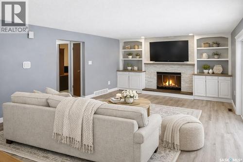 3418 Keohan Crescent, Regina, SK - Indoor Photo Showing Living Room With Fireplace