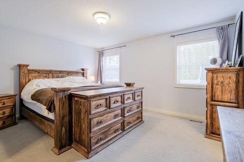 1410 Kendra Court, Kelowna, BC - Indoor Photo Showing Bedroom