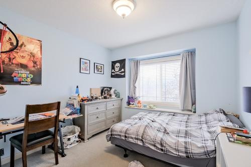 1410 Kendra Court, Kelowna, BC - Indoor Photo Showing Bedroom