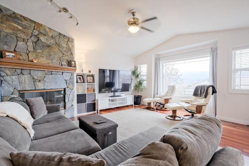 1410 Kendra Court, Kelowna, BC - Indoor Photo Showing Living Room With Fireplace