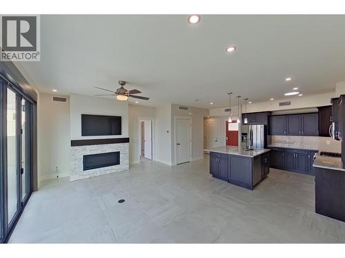 2000 Valleyview Drive Unit# 33, Osoyoos, BC - Indoor With Fireplace