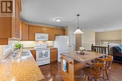 Kitchen with ample storage and moveable island - 