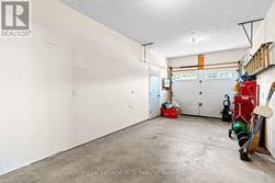 Two car garage has been divided with a wall. - 