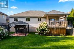 beautifully landscaped and fenced yard. - 