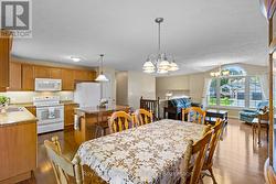 Open concept kitchen/dining/living area - 