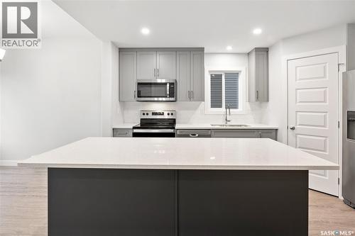 831 Brighton Boulevard, Saskatoon, SK - Indoor Photo Showing Kitchen With Upgraded Kitchen