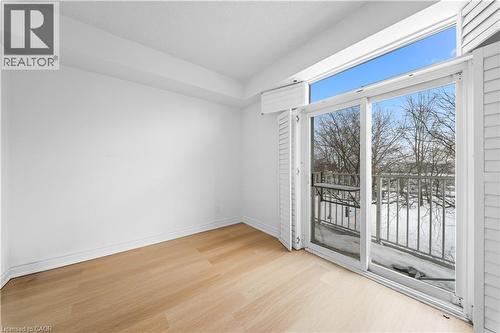 Primary Bedroom w/ Closet & Balcony - 28 Stadium Road Unit# 132, Toronto, ON - Indoor Photo Showing Other Room