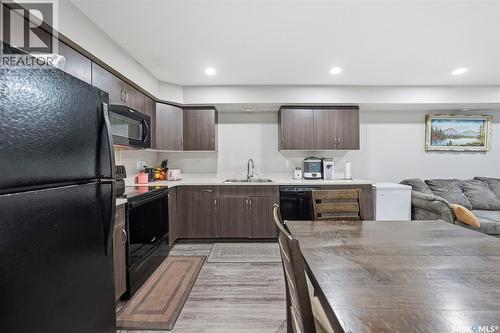 213 110 Akhtar Bend, Saskatoon, SK - Indoor Photo Showing Kitchen With Double Sink