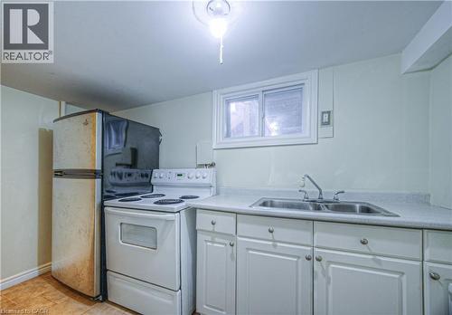100 Reid Avenue S, Hamilton, ON - Indoor Photo Showing Kitchen With Double Sink