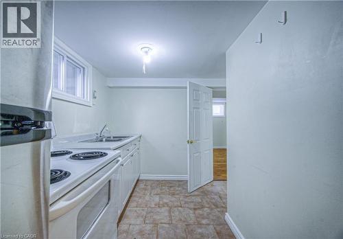 100 Reid Avenue S, Hamilton, ON - Indoor Photo Showing Kitchen With Double Sink
