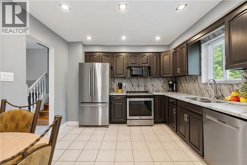 25 Burke Drive, Caledonia, ON - Indoor Photo Showing Kitchen With Double Sink