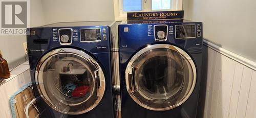 Laundry in half bath - 15 Squires Road, Eastport, NL - Indoor Photo Showing Laundry Room