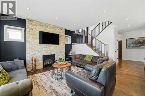 19 Vernon Close, Red Deer, AB - Indoor Photo Showing Living Room With Fireplace