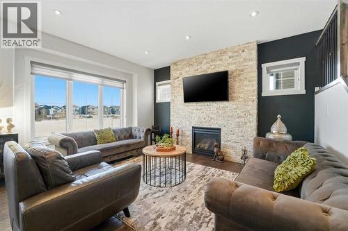 19 Vernon Close, Red Deer, AB - Indoor Photo Showing Living Room With Fireplace