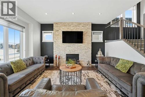19 Vernon Close, Red Deer, AB - Indoor Photo Showing Living Room With Fireplace