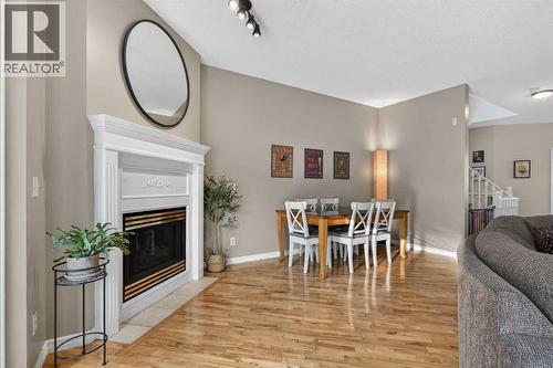 42 Hamptons Link Nw, Calgary, AB - Indoor With Fireplace