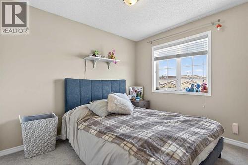 42 Hamptons Link Nw, Calgary, AB - Indoor Photo Showing Bedroom