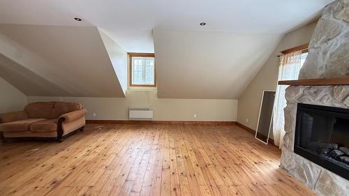 Chambre à coucher - 60 Rue Maréchal-Ferrant, Saint-Calixte, QC - Indoor With Fireplace