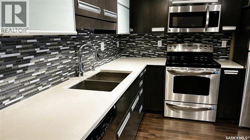 216 1510 Neville Drive, Regina, SK - Indoor Photo Showing Kitchen With Double Sink With Upgraded Kitchen