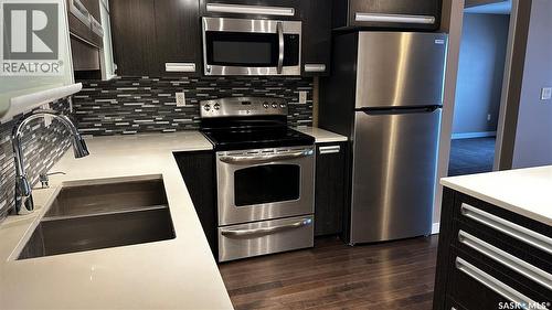 216 1510 Neville Drive, Regina, SK - Indoor Photo Showing Kitchen With Double Sink With Upgraded Kitchen