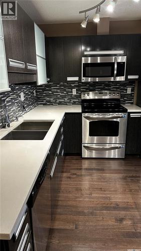 216 1510 Neville Drive, Regina, SK - Indoor Photo Showing Kitchen With Double Sink With Upgraded Kitchen
