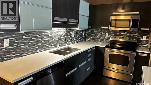 216 1510 Neville Drive, Regina, SK - Indoor Photo Showing Kitchen With Double Sink