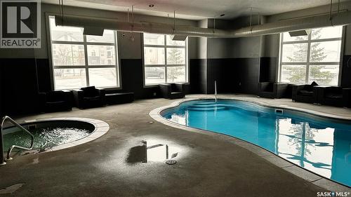 216 1510 Neville Drive, Regina, SK - Indoor Photo Showing Other Room With In Ground Pool