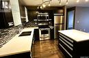 216 1510 Neville Drive, Regina, SK  - Indoor Photo Showing Kitchen With Double Sink 