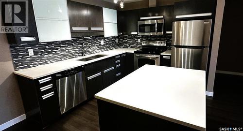 216 1510 Neville Drive, Regina, SK - Indoor Photo Showing Kitchen With Double Sink With Upgraded Kitchen