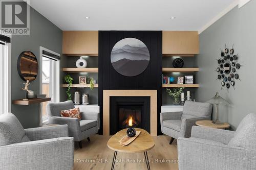 34 Ruby Crescent, Orillia, ON - Indoor Photo Showing Living Room With Fireplace