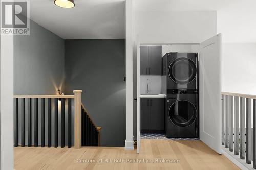 laundry on primary bedroom floor - 34 Ruby Crescent, Orillia, ON - Indoor Photo Showing Laundry Room