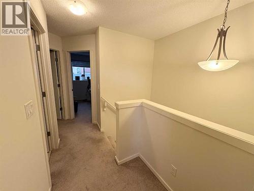 36 Evansborough Common Nw, Calgary, AB - Indoor Photo Showing Other Room