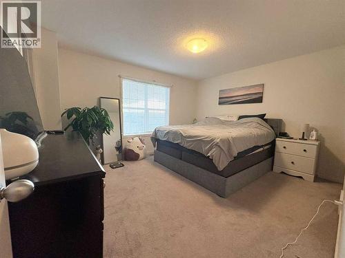 36 Evansborough Common Nw, Calgary, AB - Indoor Photo Showing Bedroom