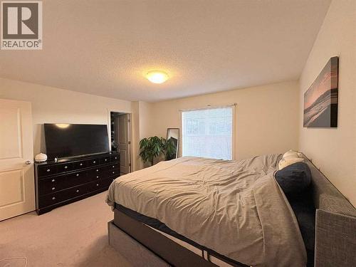 36 Evansborough Common Nw, Calgary, AB - Indoor Photo Showing Bedroom