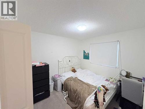 36 Evansborough Common Nw, Calgary, AB - Indoor Photo Showing Bedroom