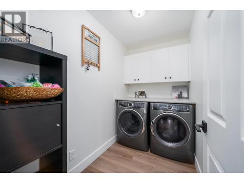 Main floor laundry - 3841 Glen Canyon Drive, West Kelowna, BC - Indoor Photo Showing Laundry Room