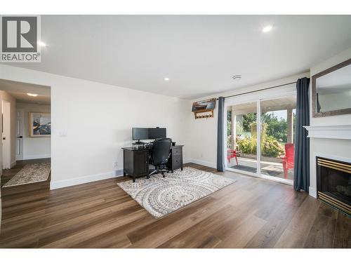 3841 Glen Canyon Drive, West Kelowna, BC - Indoor Photo Showing Living Room With Fireplace