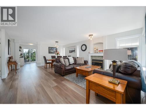 3841 Glen Canyon Drive, West Kelowna, BC - Indoor Photo Showing Living Room With Fireplace