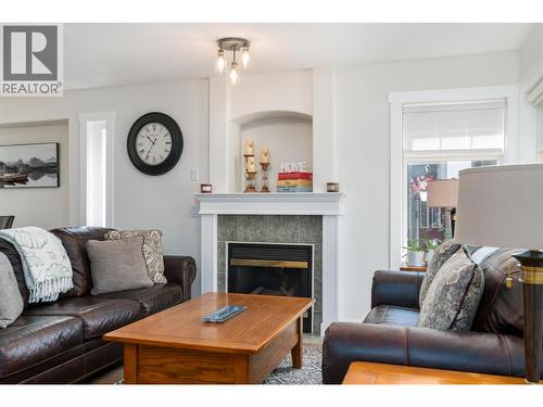3841 Glen Canyon Drive, West Kelowna, BC - Indoor Photo Showing Living Room With Fireplace