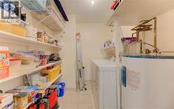 In-Suite laundry and storage area. - 