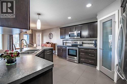 60 Vincent Close, Red Deer, AB - Indoor Photo Showing Kitchen With Stainless Steel Kitchen With Double Sink With Upgraded Kitchen
