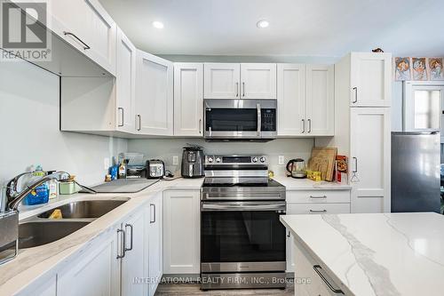 39 Holmes Avenue, Hamilton, ON - Indoor Photo Showing Kitchen With Double Sink