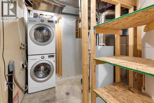 103 Canoe Square Sw, Airdrie, AB - Indoor Photo Showing Laundry Room