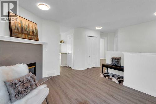 103 Canoe Square Sw, Airdrie, AB - Indoor With Fireplace