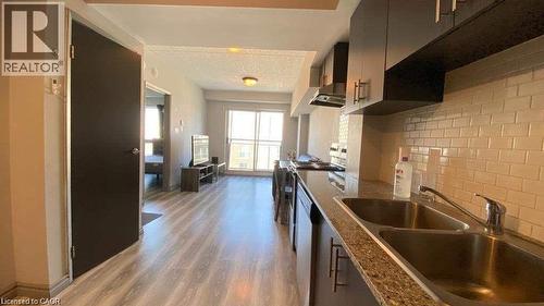 275 Larch Street Unit# G503, Waterloo, ON - Indoor Photo Showing Kitchen With Double Sink
